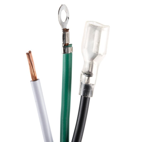 A close-up of a 6' power cord with a green and white wire and a green ground wire.