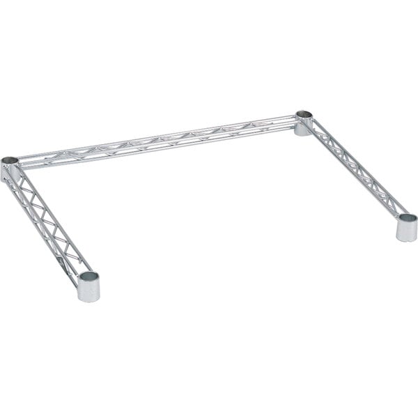 A silver metal Metro Super Erecta double snake frame with metal legs.