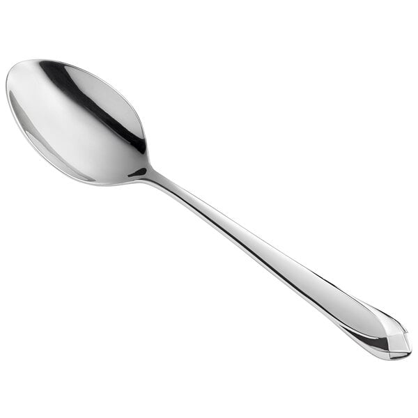 A WMF by BauscherHepp Juwel stainless steel serving spoon with a silver handle and spoon.