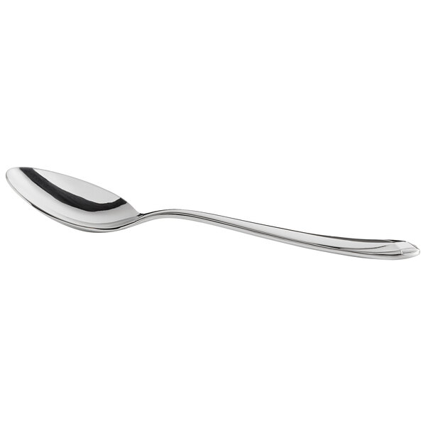 A WMF by BauscherHepp silver stainless steel serving spoon.