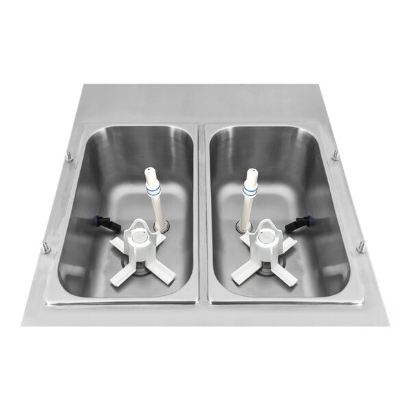 A stainless steel countertop soft serve ice cream machine with two hoppers and internal mixing paddles.