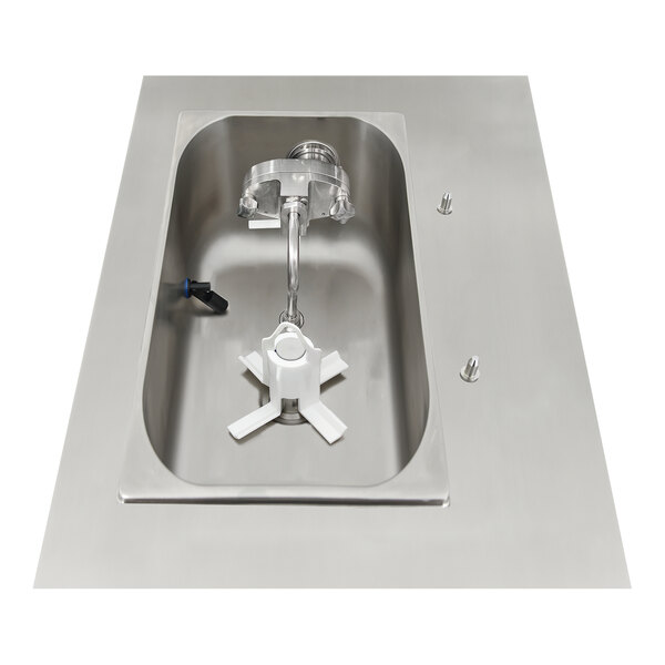 A stainless steel countertop soft serve ice cream machine with a single hopper and dispensing mechanism.