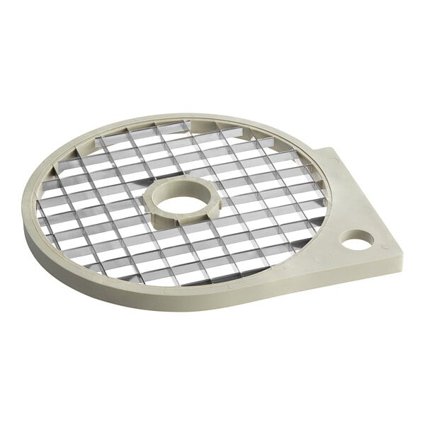 A white metal circular dicing grid with holes.