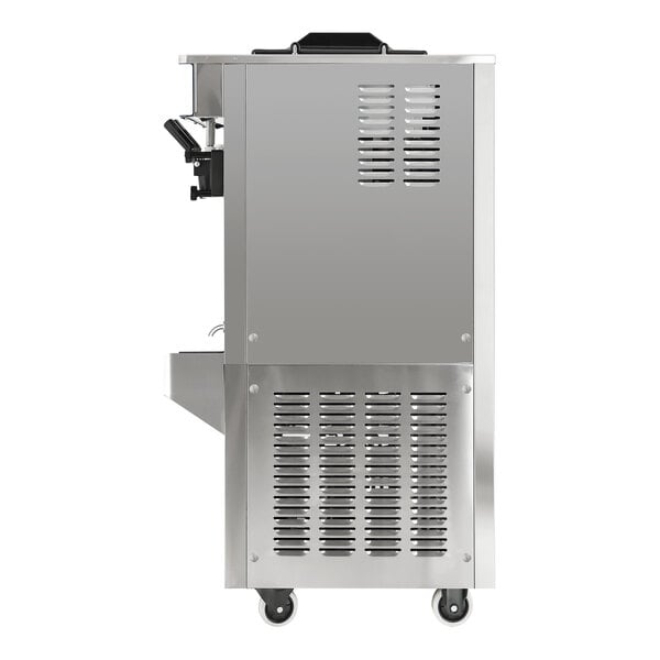 A stainless steel floor model soft serve ice cream machine with two hoppers, three dispensers, and ventilation panels on the side.
