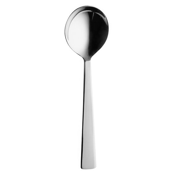 A silver Hepp by Bauscher spoon with a long white handle.