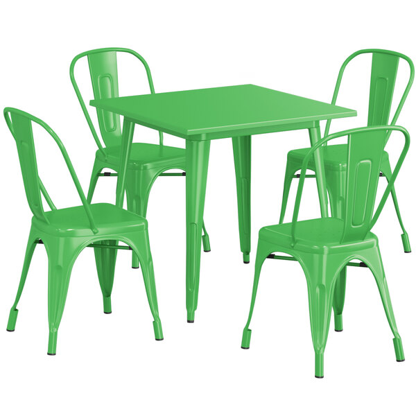 A green Lancaster Table & Seating outdoor table with four green plastic chairs.