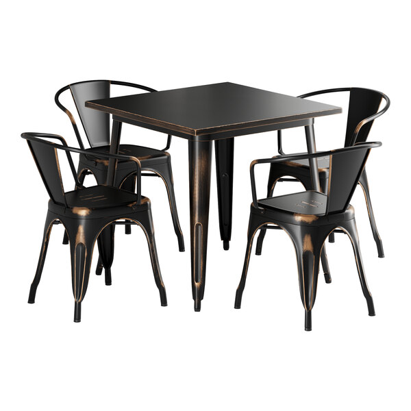 A black Lancaster Table & Seating Alloy Series outdoor table with a brown edge next to four black chairs.
