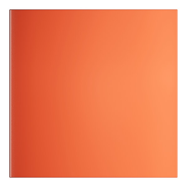 A close up of a square orange table top.