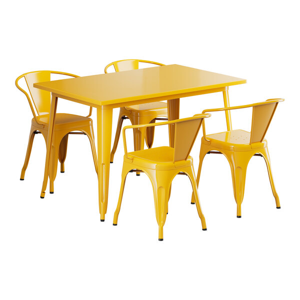 A Lancaster Table & Seating citrine yellow metal table and chairs set.