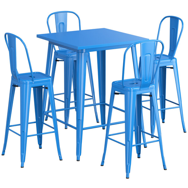 A blue rectangular Lancaster Table & Seating outdoor table with four blue bar stools.