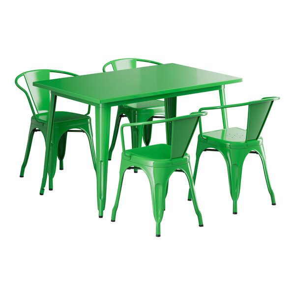 A jade green table and chairs on a patio.