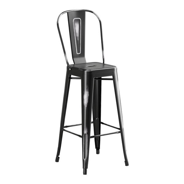 A black metal barstool with a back.