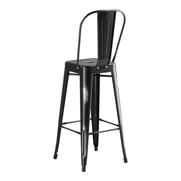 A black metal barstool with a backrest.