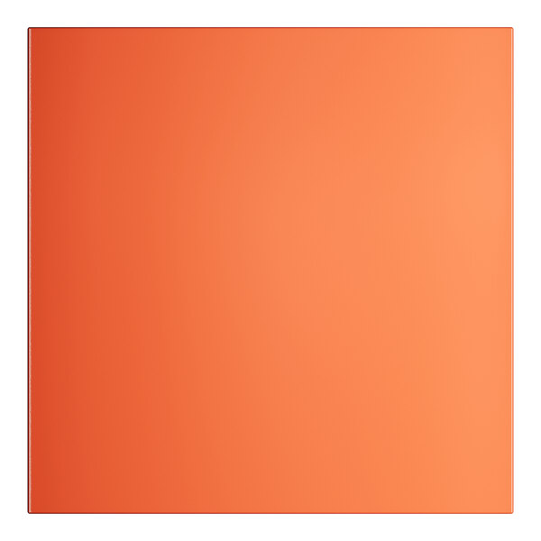 A close up of a square orange Lancaster Table and Seating outdoor table top.