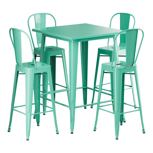 A Lancaster Table & Seating aquamarine bar height table with four green chairs.