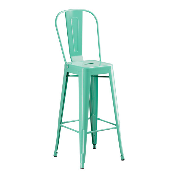 A Lancaster Table & Seating aquamarine metal barstool with a backrest.