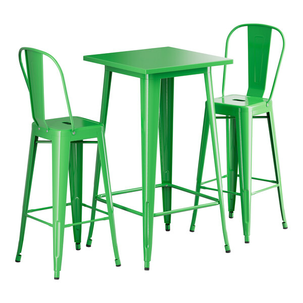 A Lancaster Table & Seating jade green table with two green barstools.