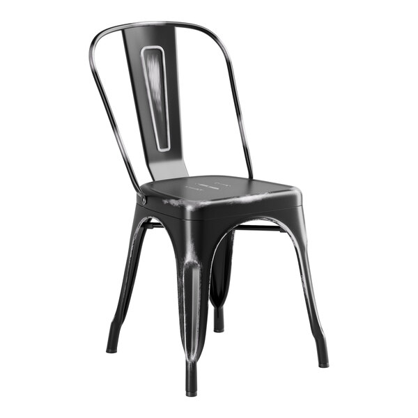 A black metal chair with a white back.