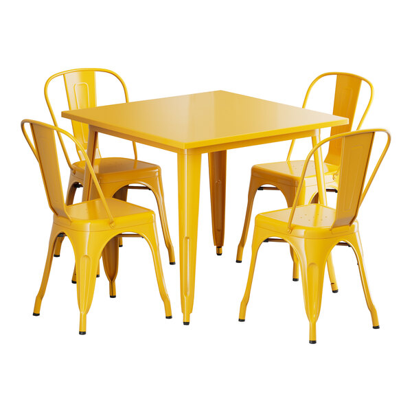 A Lancaster Table & Seating citrine yellow metal table and chairs set with a yellow table and four chairs.