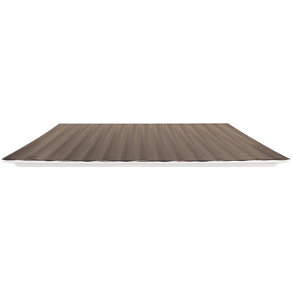 A brown textured Elite Global Solutions melamine platter on a brown surface.