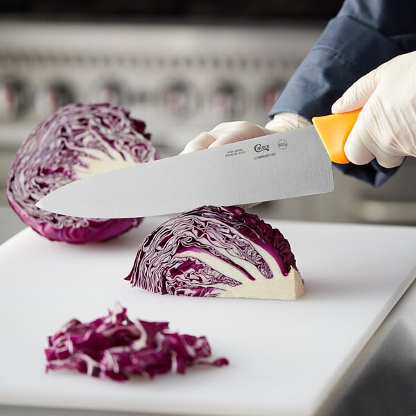 a piece of cabbage on a white surface