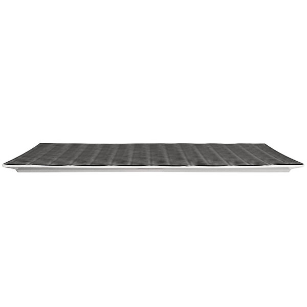A rectangular black melamine platter with a textured white surface.