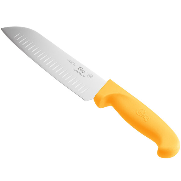 A Choice Santoku knife with a neon yellow handle.
