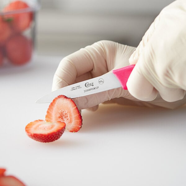 a close up of a strawberry