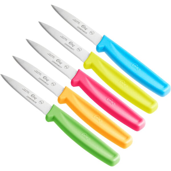 A group of Choice paring knives with different colored handles.