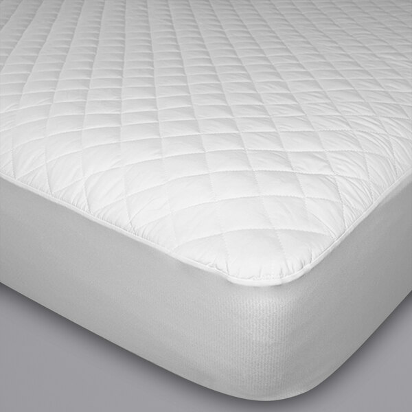 A white Protect-A-Bed mattress protector with a quilted surface.