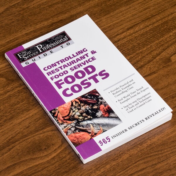 A book titled "Controlling Restaurant & Food Service Food Costs" on a table.