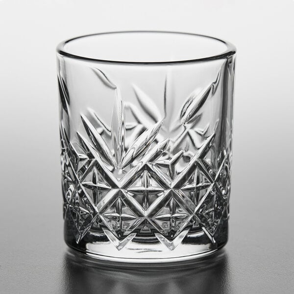 A Pasabahce Timeless Vintage juice glass with a pattern on it.