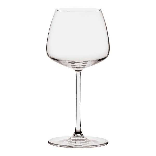 A clear wine glass with a long stem.