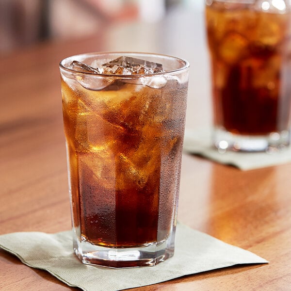 Two Pasabahce Casablanca beverage glasses of iced tea on a table.