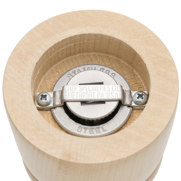 A wooden Chef Specialties Windsor pepper mill and salt shaker with a circular metal knob on top.