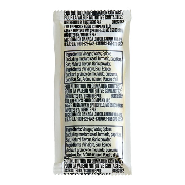 A single-serve packet of French's Classic Yellow Mustard.