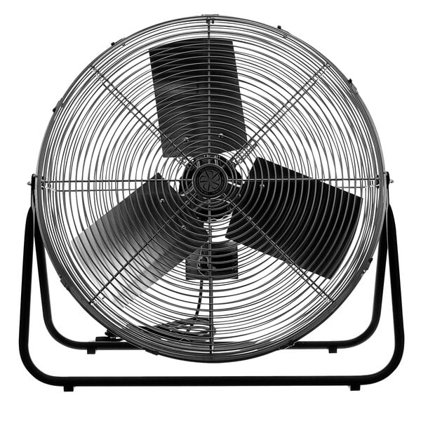 A large black TPI industrial floor fan with black legs.