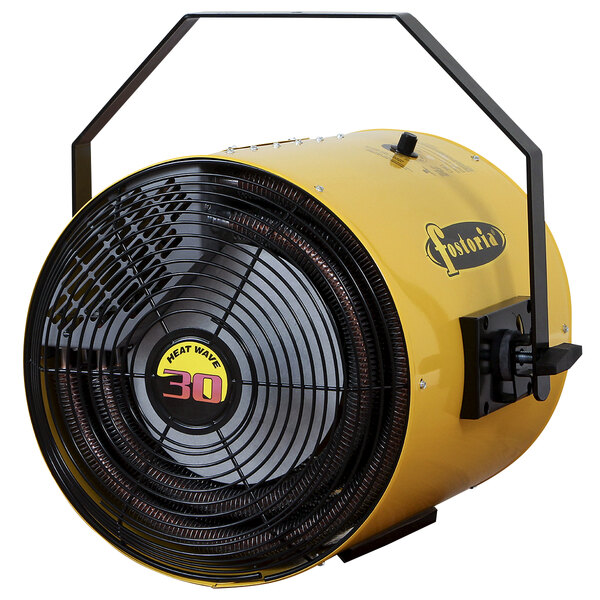 A yellow TPI industrial salamander heater with a black handle and a fan.