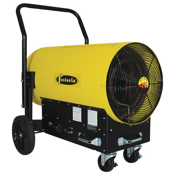 A yellow and black Fostoria portable electric salamander heater on wheels.