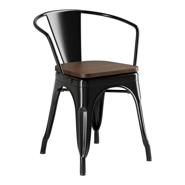 A black metal Lancaster Table & Seating chair with a walnut wood seat.