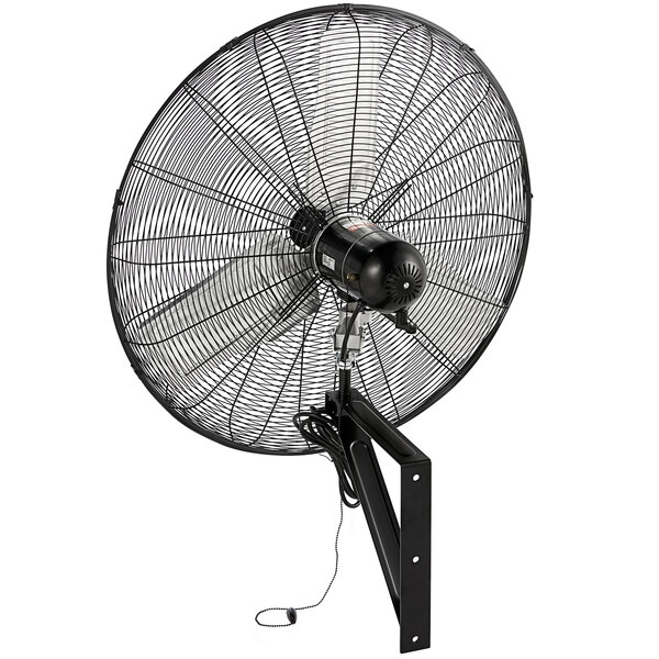 A black TPI industrial wall-mounted fan with a round fan.