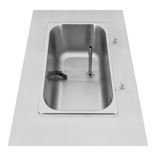 A Spaceman countertop stainless steel slushy machine with a handle.