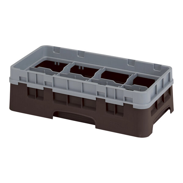 A brown plastic rack with eight compartments and a brown extender.