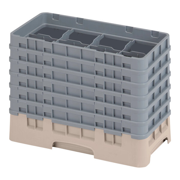 A beige plastic Cambro glass rack with extenders.