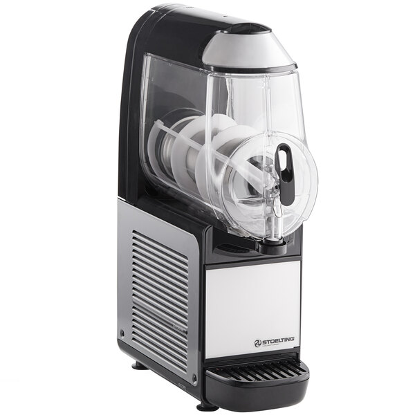 A Stoelting frozen beverage machine with a clear container on top.