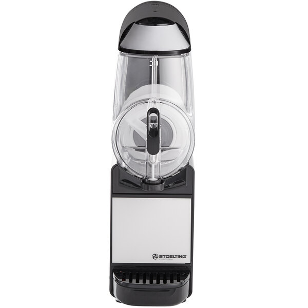 A black and white Stoelting frozen beverage machine with a glass lid.