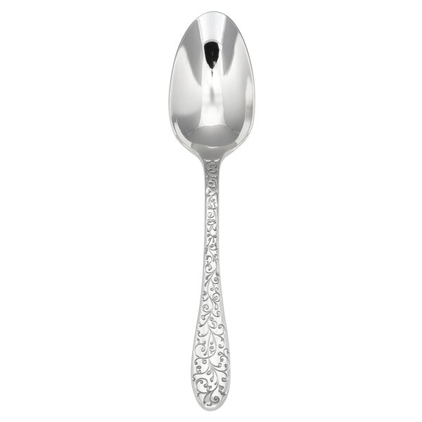 A silver Oneida Ivy Flourish soup/dessert spoon with a floral pattern.