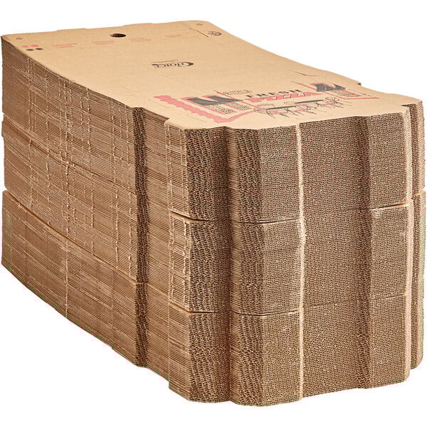 A stack of Choice kraft corrugated pizza boxes.