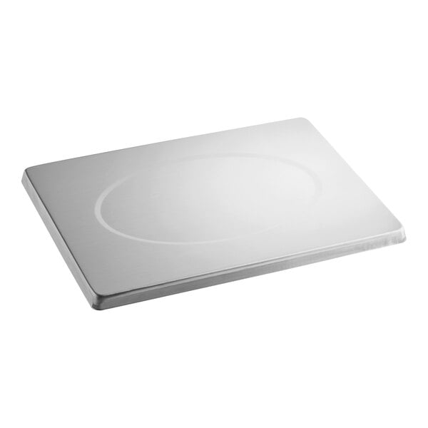 A white rectangular object with a circle and oval design.