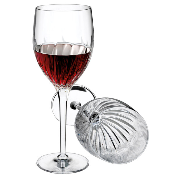 A Luigi Bormioli wine glass with a silver rim.
